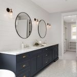 elegant-new-jersey-bathroom-remodel-with-white-marble-flooring-and-black-vanity
